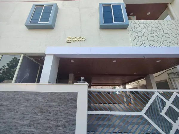Vaibhavam Vididhillu building front with Telugu name board 2